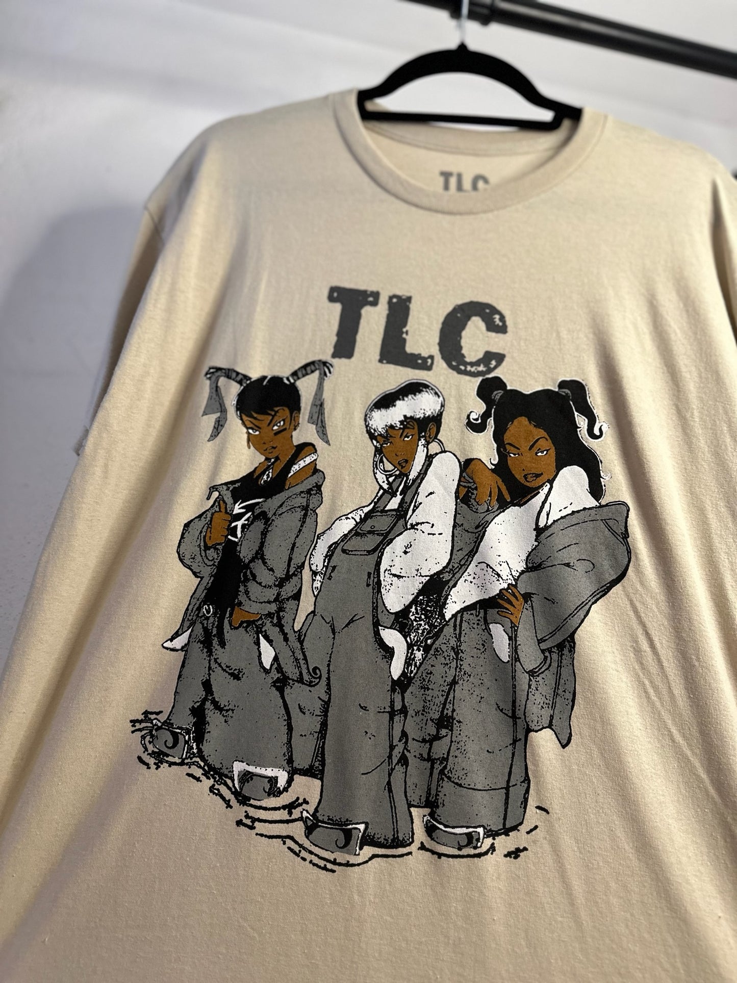 PLAYERA TLC